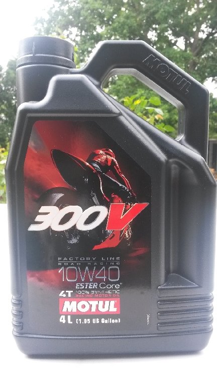 Pièces moto Consommable occasion : MOTUL 300V 10W40 4T Racing 4 Litres