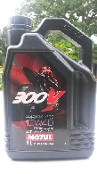 Pièces moto, Consommable occasion : MOTUL 300V 10W40 4T Racing 4 Litres